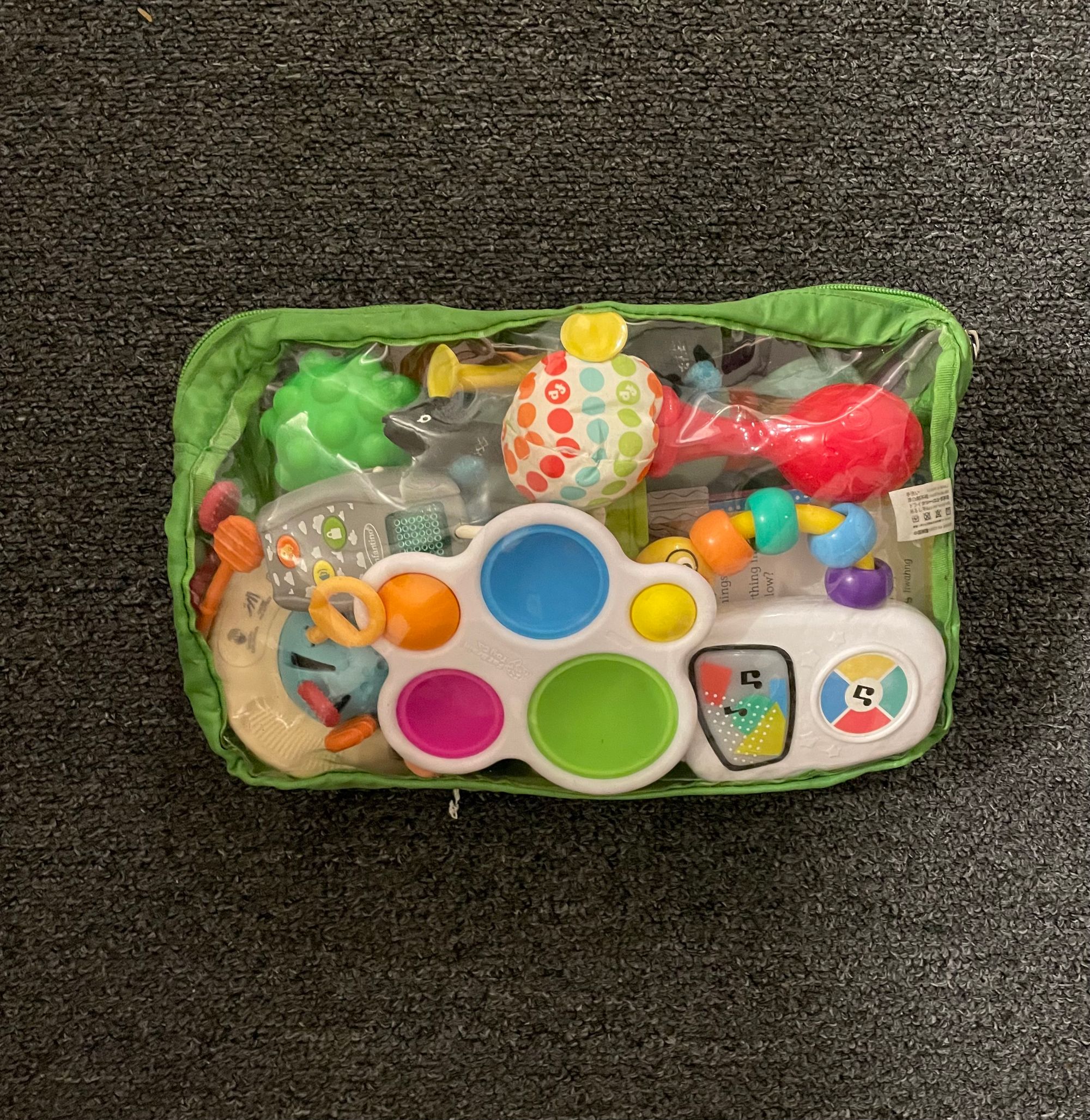 Bag of toys for traveling with an infant